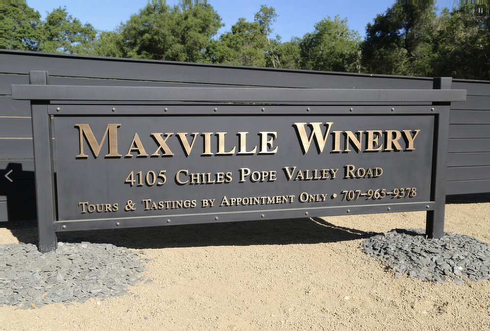 Maxville Winery sign at 4105 Chiles Pope Valley Road with contact info and tasting details.